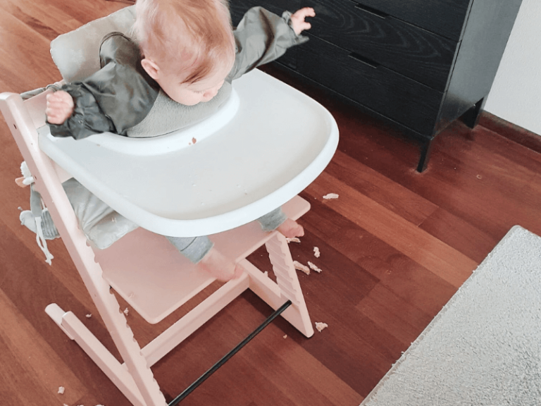 why do babies throw food on the floor